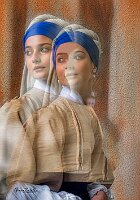 Ragazza-orecchino-di-perla-doppia-esosizione
